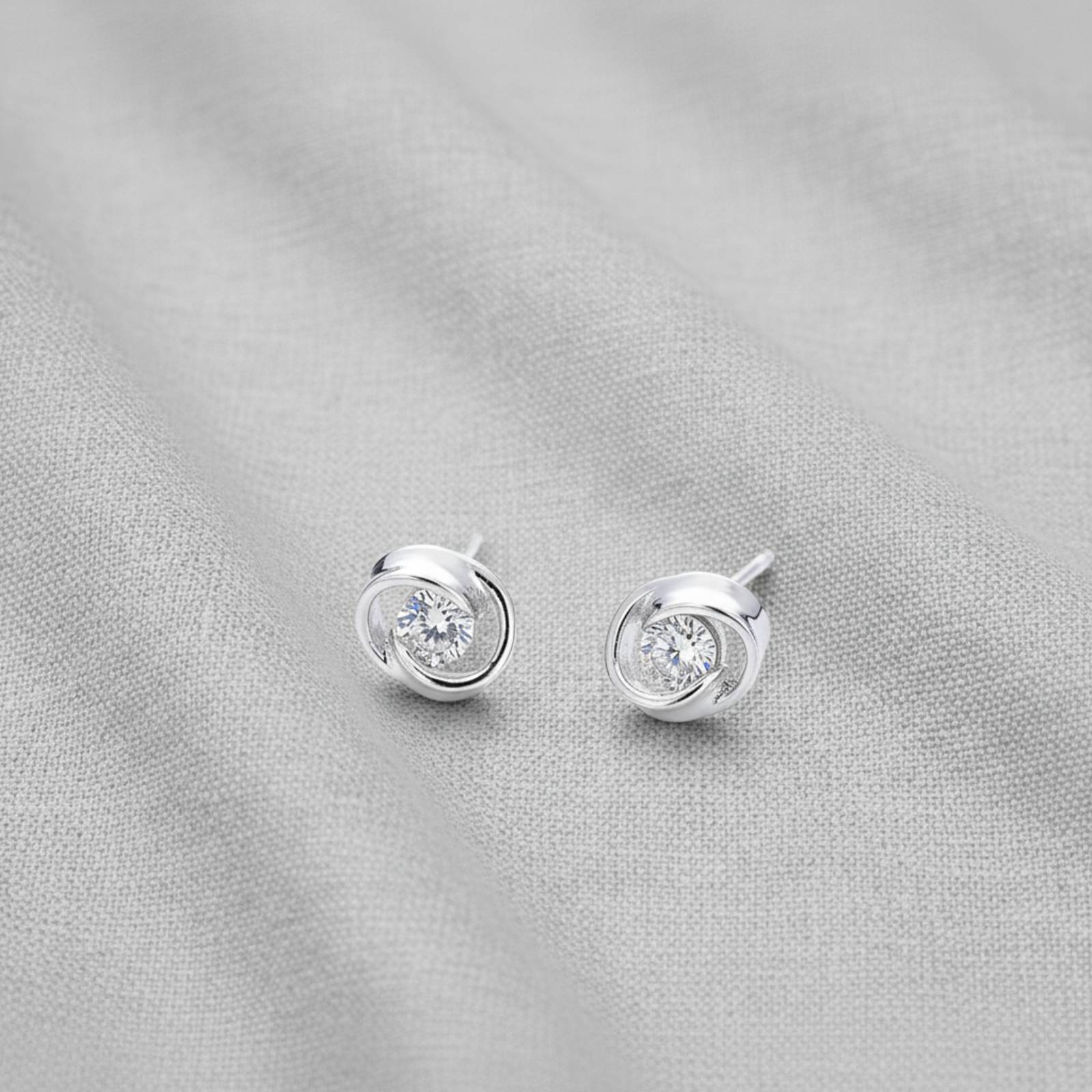 Clear Swirl Studs on Linen
