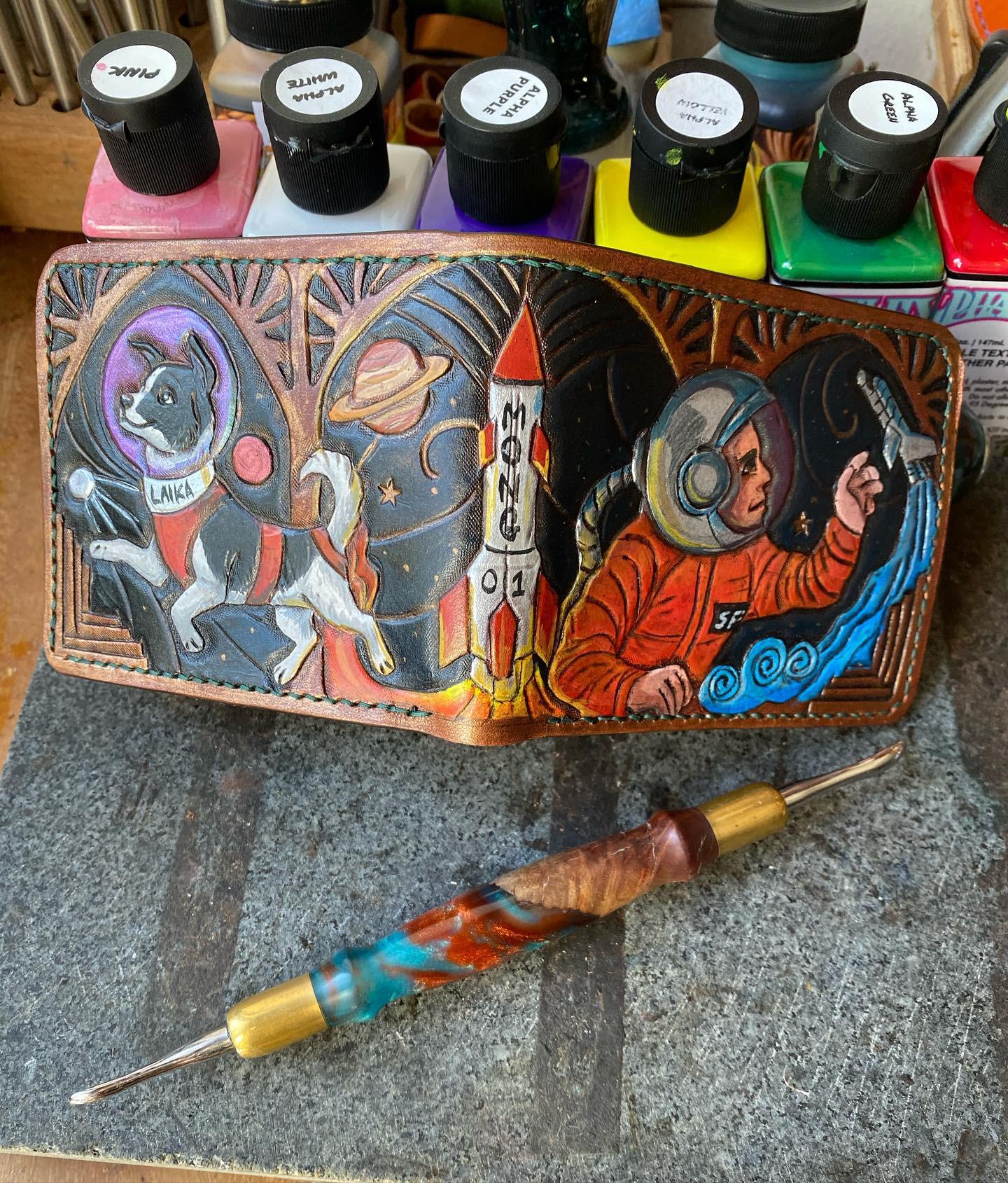 An epic custom wallet taking inspiration from the cosmonauts and the brave little space-dog Laika. Carved with art noveau lines with round symmetrical motifs.
