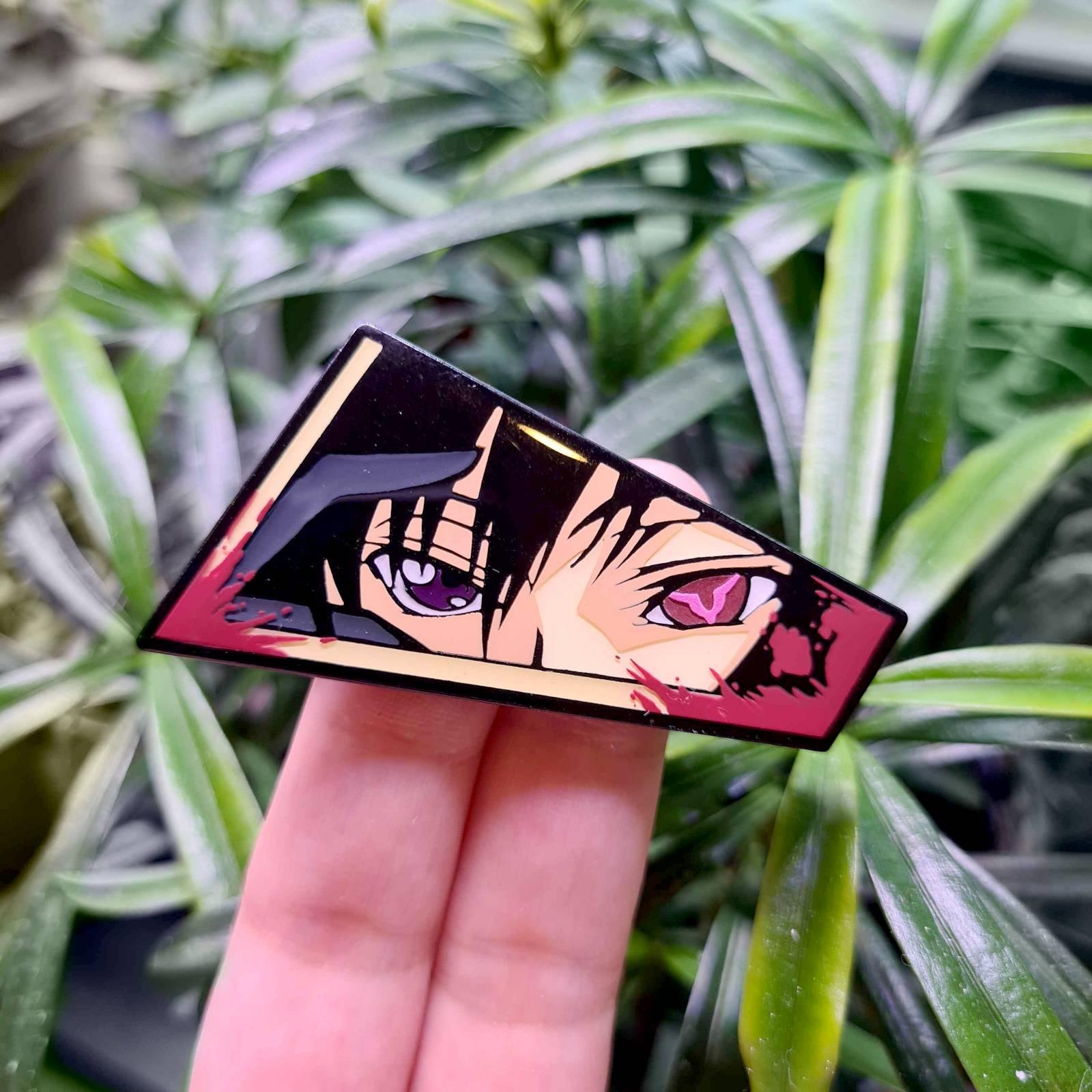Rebellion Eyes Enamel Pin