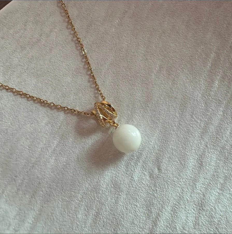 Lynn Infinite Bow Pendant