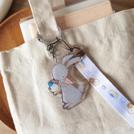 Rabbit Pouring Tea - Wristlet Lanyard & Double Sided on Clear Acrylic Keychain - https://hitpay-production.s3.ap-southeast-1.amazonaws.com/products/9df90c27eef441cbb7669f5dbf5e84cc.jpeg