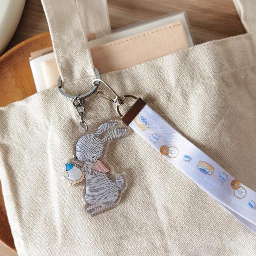 Rabbit Pouring Tea - Wristlet Lanyard & Double Sided on Clear Acrylic Keychain - https://hitpay-production.s3.ap-southeast-1.amazonaws.com/products/9df90c286b24425187323a34450f094b.jpeg