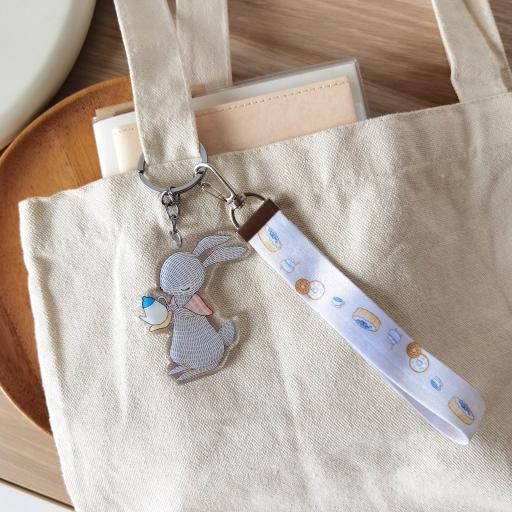 Rabbit Pouring Tea - Wristlet Lanyard & Double Sided on Clear Acrylic Keychain - https://hitpay-production.s3.ap-southeast-1.amazonaws.com/products/9df90c2a334a442db0cdab0e0d5ae1e9.jpeg