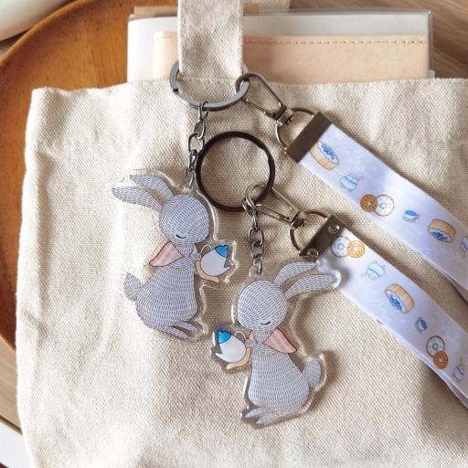 Rabbit Pouring Tea - Wristlet Lanyard & Double Sided on Clear Acrylic Keychain - https://hitpay-production.s3.ap-southeast-1.amazonaws.com/products/9df90c2a6a1f421b9255d84fd54bc2fa.jpeg
