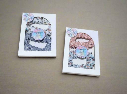 Pack of 2 Scrunchies - https://hitpay-production.s3.ap-southeast-1.amazonaws.com/products/9f4eb4c250cd49fdb4597eb38c5db494.jpeg