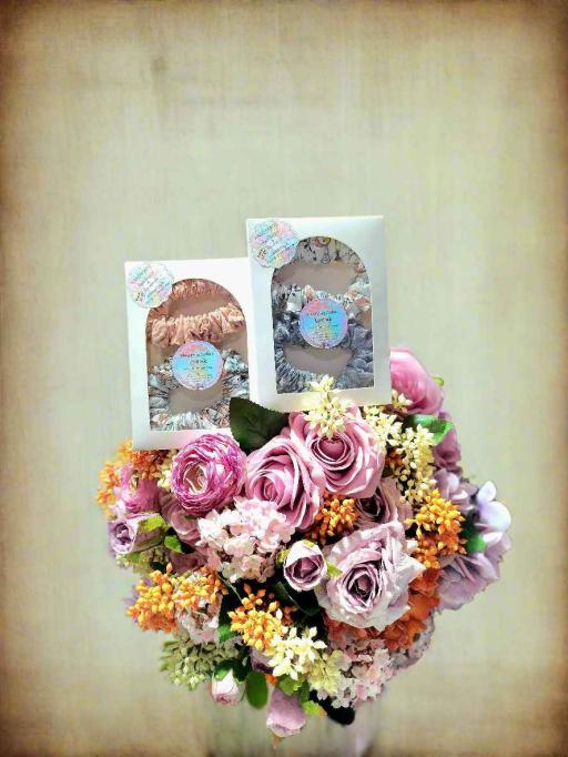 Pack of 2 Scrunchies - https://hitpay-production.s3.ap-southeast-1.amazonaws.com/products/9f4eb4c363594f90b6f5678d4e295934.jpeg